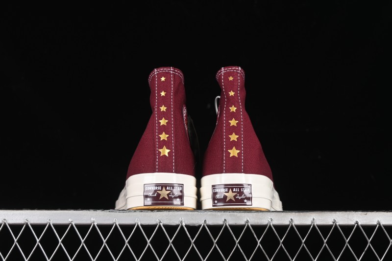 Converse Chuck 1970s High Top Casual Sneakers with Gold Star Accents and Wine Red Colorway - A12463C