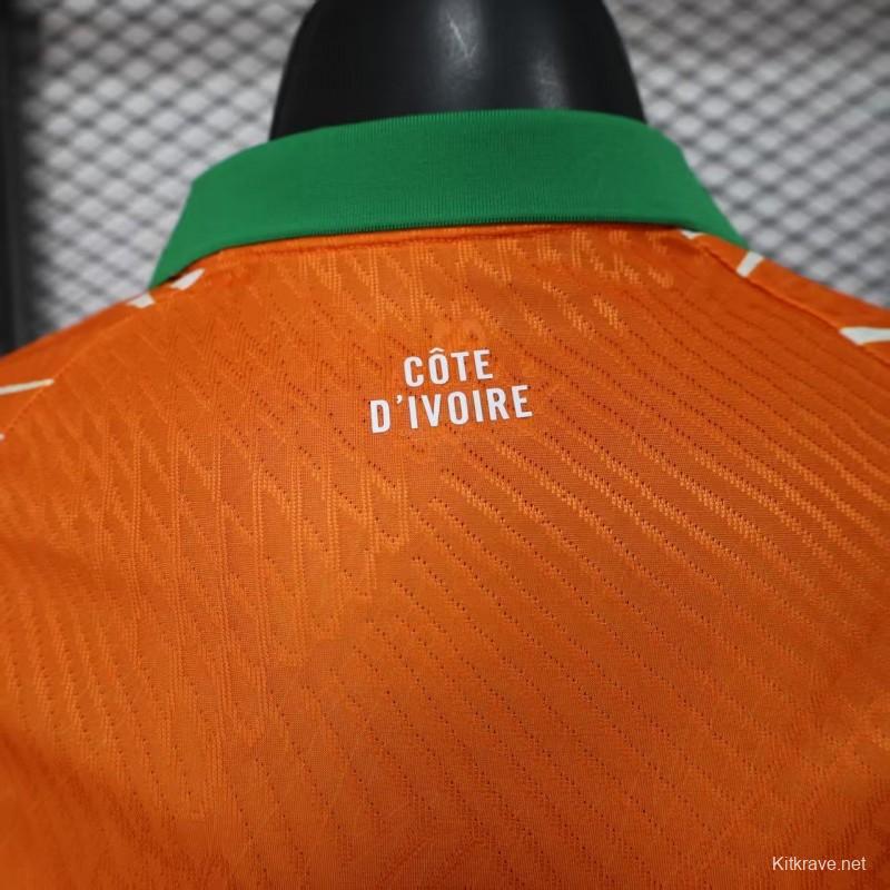 Player Version 2025 Ivory Coast Orange with Elephant Graphic and Green Accents Jersey